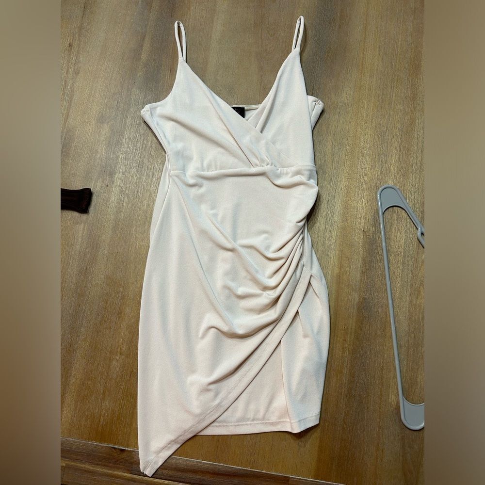 Cream, mini wrap dress. Never worn new with tags in perfect condition.